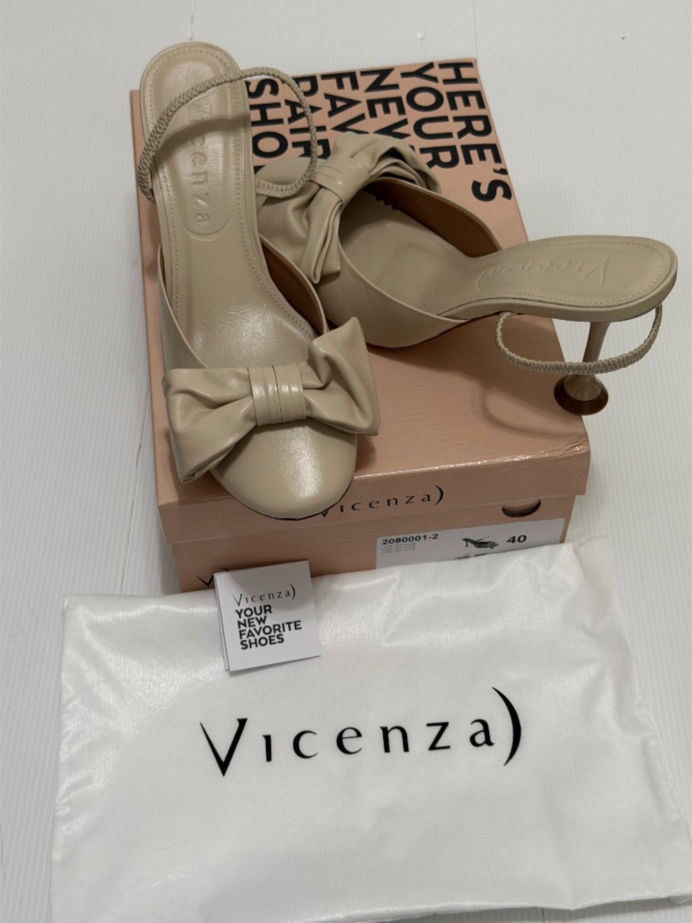 Vicenza Round-Toe Bow Mule Heels. Size 9